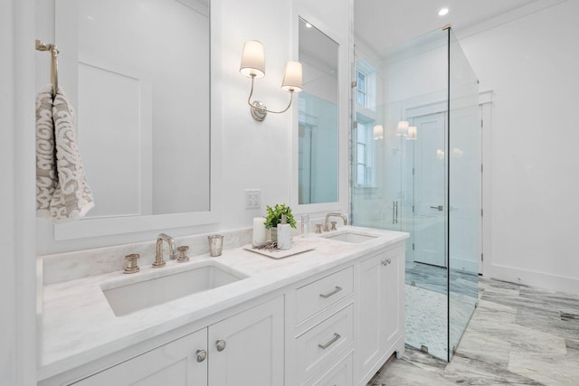 bathroom with double sink vanity and an enclosed shower