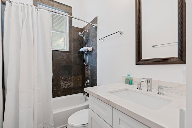 full bathroom featuring shower / bath combo, vanity, and toilet