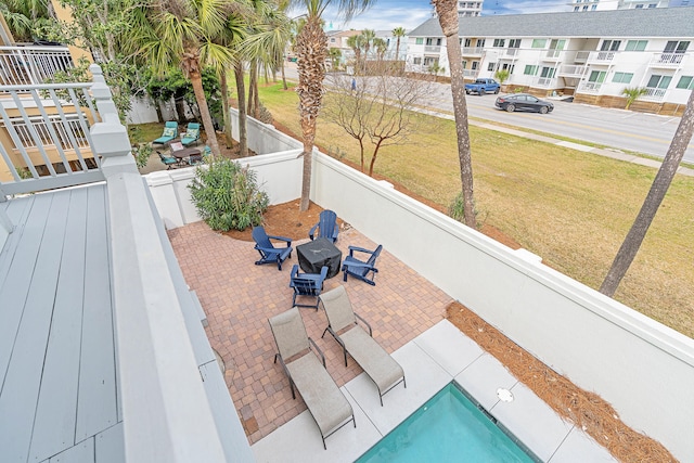 view of patio with a fenced in pool