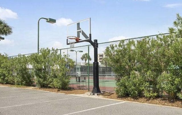 view of sport court with tennis court