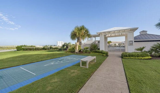 view of community featuring a lawn