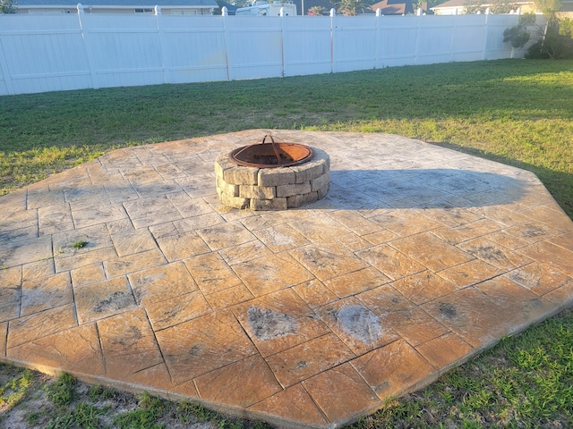 view of patio / terrace with a fire pit