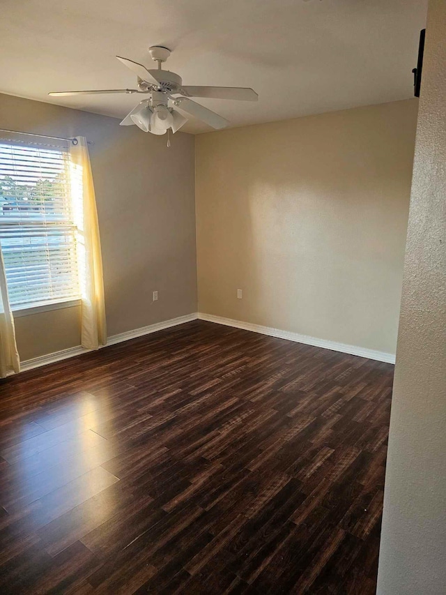 unfurnished room featuring ceiling fan and hardwood / wood-style flooring