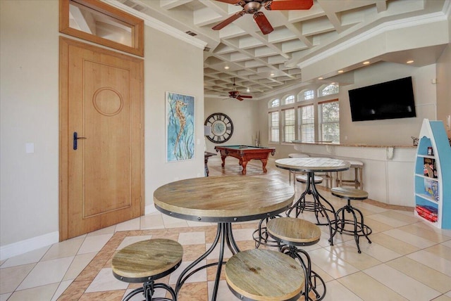 tiled dining room featuring coffered ceiling, ceiling fan, pool table, crown molding, and beamed ceiling