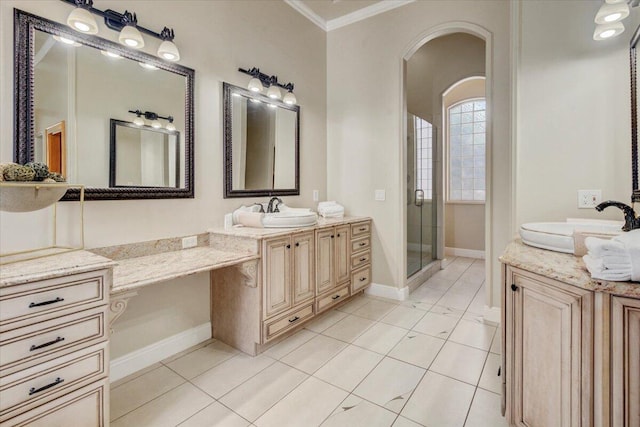 bathroom featuring a shower with shower door, vanity, tile patterned floors, and crown molding