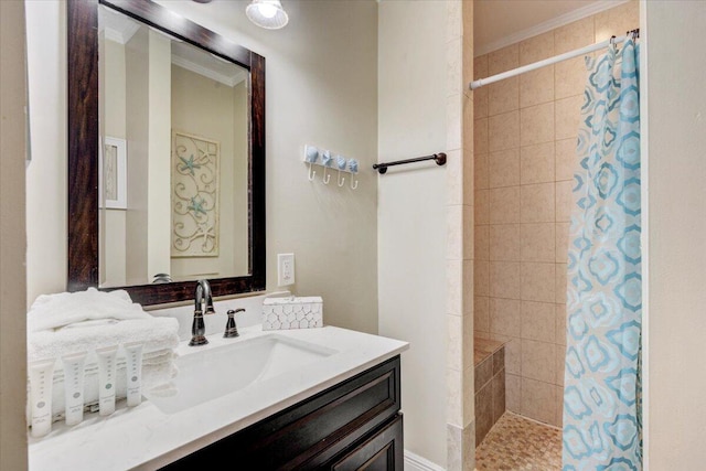 bathroom with vanity, a shower with curtain, and ornamental molding