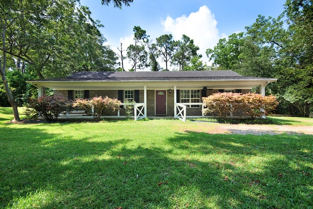 ranch-style home with a front yard