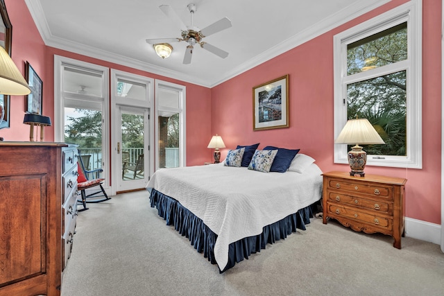 bedroom with light carpet, ceiling fan, crown molding, and multiple windows