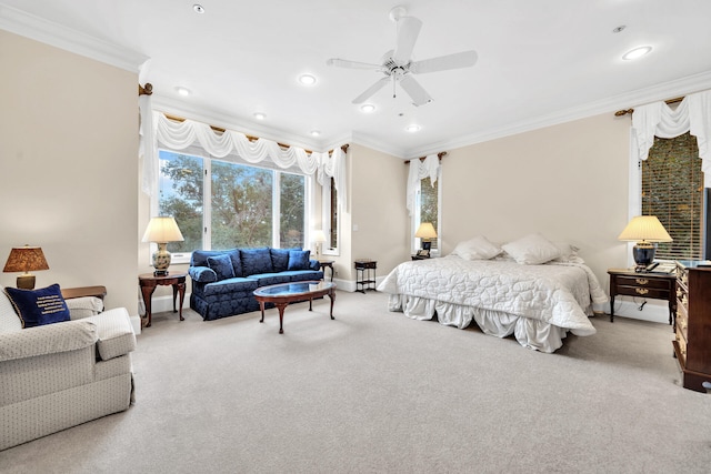 bedroom featuring light colored carpet, ceiling fan, and ornamental molding