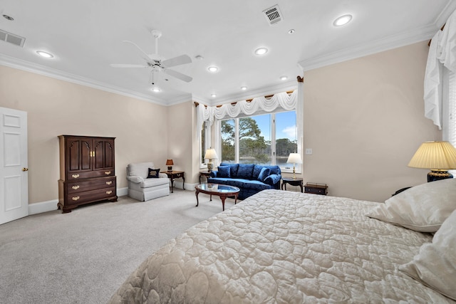 bedroom featuring crown molding, light colored carpet, and ceiling fan