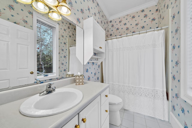 bathroom with crown molding, toilet, vanity with extensive cabinet space, and tile flooring