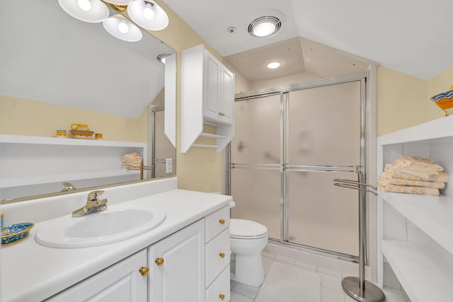 bathroom with oversized vanity, vaulted ceiling, toilet, and tile flooring