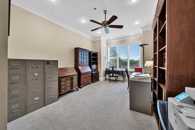 carpeted office featuring ceiling fan and ornamental molding