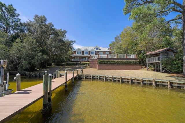 dock area featuring a water view