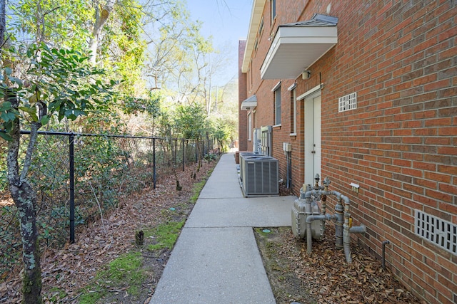 view of yard with central AC unit