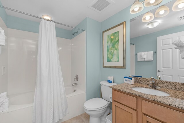 4203 Indian Bayou Trl Unit 1712, Destin, FL 32541 - bathroom featuring shower / bath combination with curtain, vanity, toilet, and tile patterned floors