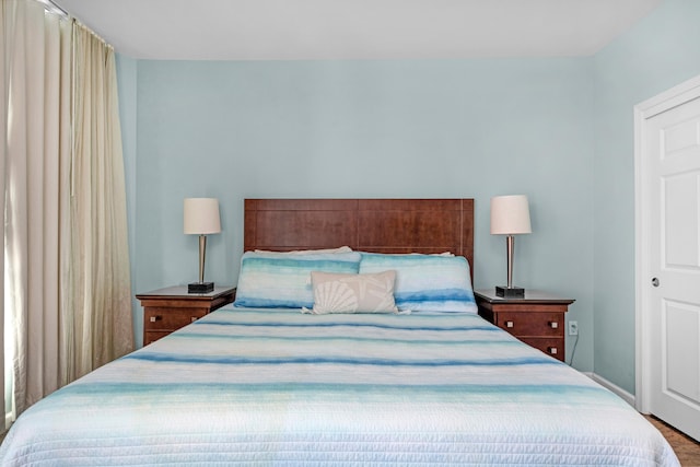 bedroom featuring wood-type flooring