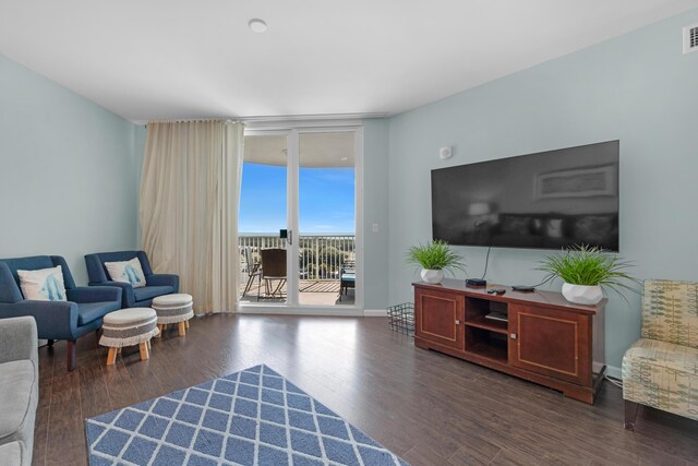 4203 Indian Bayou Trl Unit 1712, Destin, FL 32541 - living room with floor to ceiling windows and wood finished floors