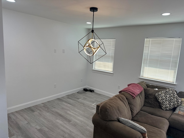 living room with light hardwood / wood-style flooring