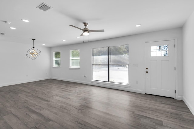 foyer entrance featuring hardwood / wood-style flooring and ceiling fan