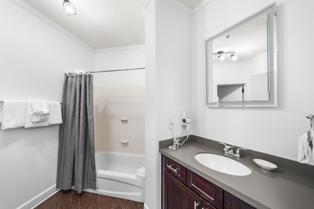 bathroom with wood-type flooring, a textured ceiling, shower / bath combo with shower curtain, vanity, and ornamental molding