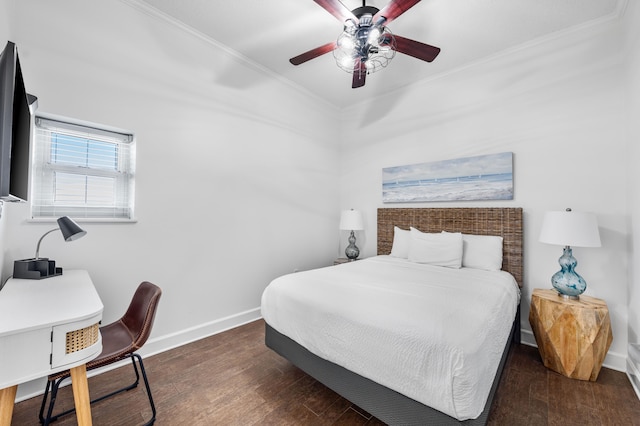 bedroom featuring ceiling fan, dark hardwood / wood-style flooring, and crown molding