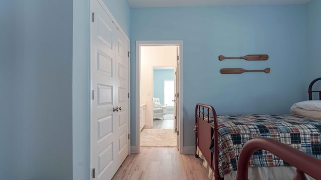 bedroom featuring light wood-type flooring