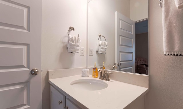 bathroom with vanity with extensive cabinet space