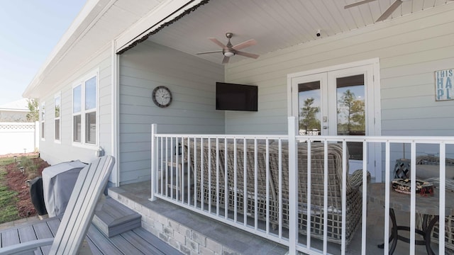 exterior space with ceiling fan