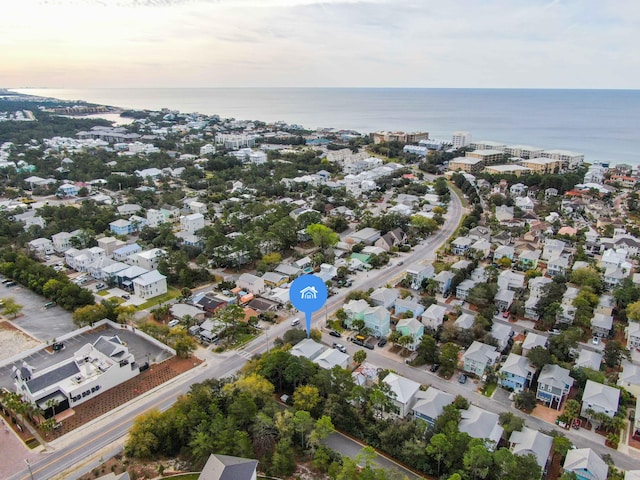 aerial view at dusk with a water view