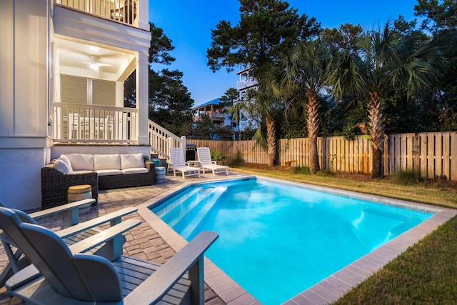 view of swimming pool with a patio and an outdoor hangout area