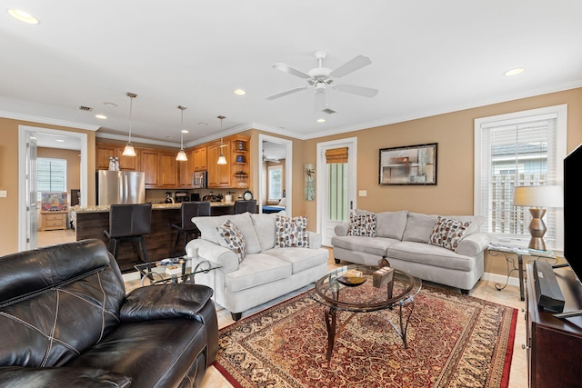 living room with ceiling fan, crown molding, and light hardwood / wood-style flooring