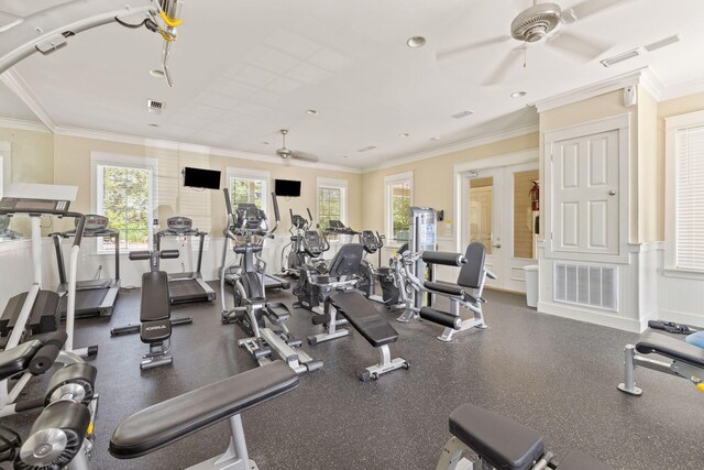 workout area featuring french doors, ceiling fan, and crown molding