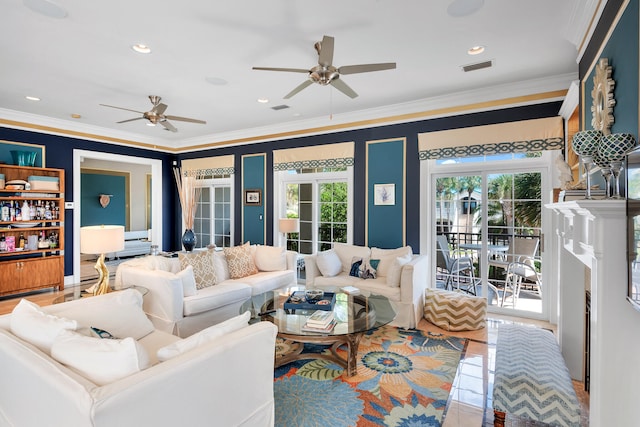 living room featuring tile flooring, plenty of natural light, crown molding, and ceiling fan