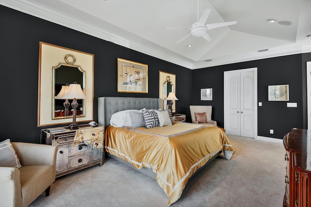 bedroom with ornamental molding, light carpet, ceiling fan, and lofted ceiling