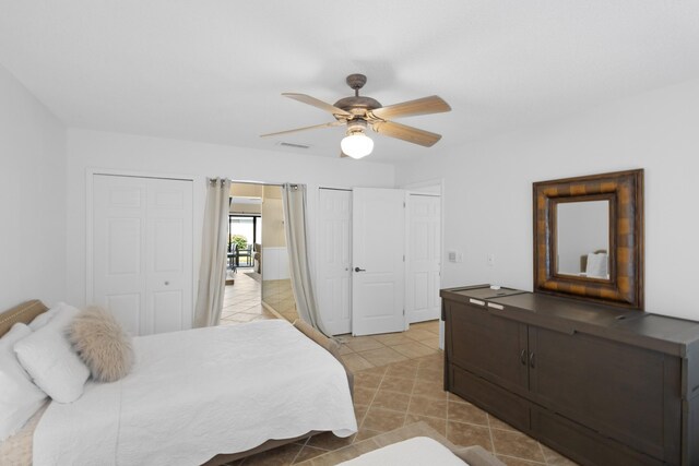 bedroom featuring ceiling fan and light tile patterned flooring