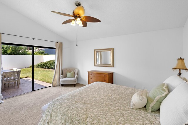 carpeted bedroom with ceiling fan, lofted ceiling, and access to exterior