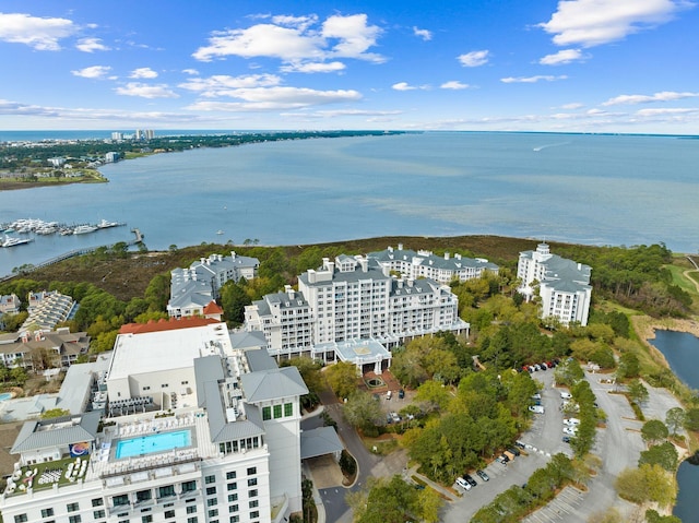 birds eye view of property with a water view