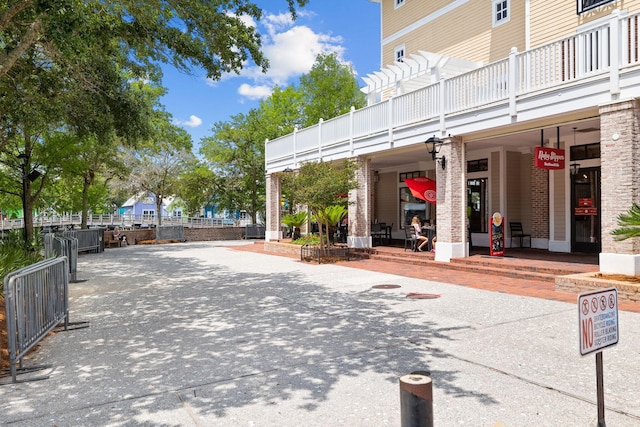 surrounding community with a pergola