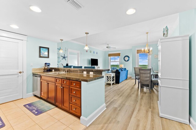 kitchen featuring ceiling fan with notable chandelier, crown molding, light wood-type flooring, sink, and dishwasher