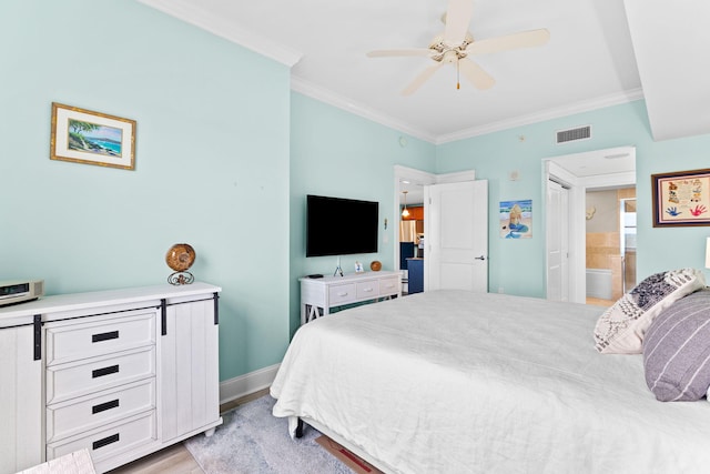 bedroom with crown molding, ceiling fan, ensuite bathroom, and light wood-type flooring