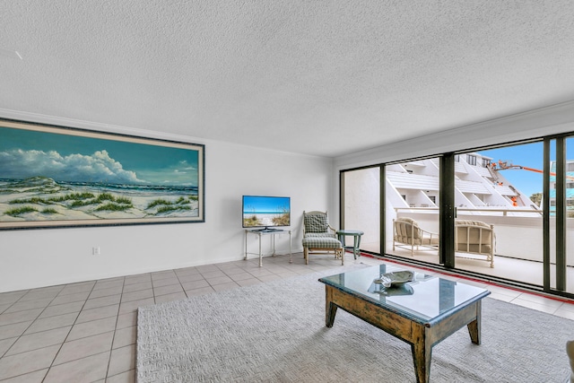 unfurnished living room featuring a textured ceiling and light tile patterned floors