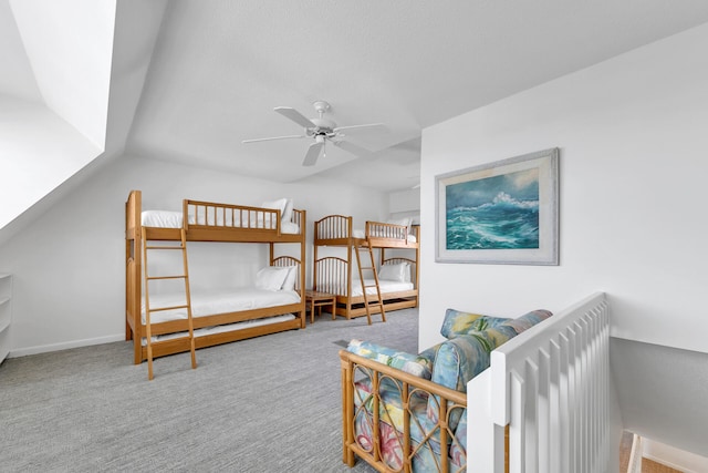 bedroom featuring light carpet, vaulted ceiling, and ceiling fan