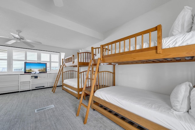 bedroom featuring light carpet and ceiling fan