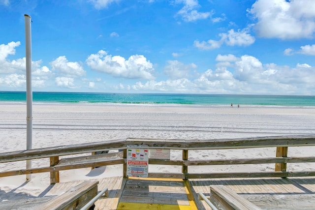 property view of water featuring a beach view