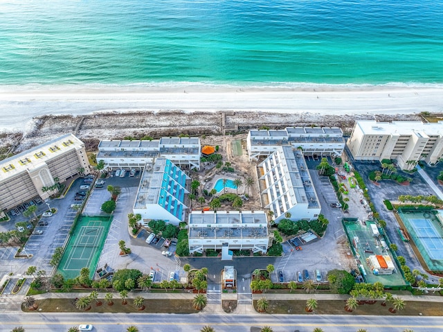 bird's eye view with a view of the beach and a water view