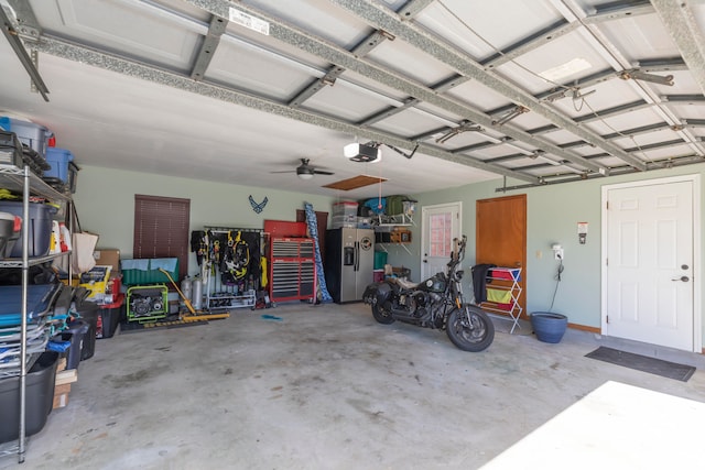 garage featuring ceiling fan and a garage door opener