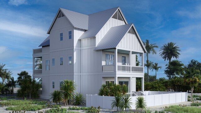 view of side of home featuring a balcony