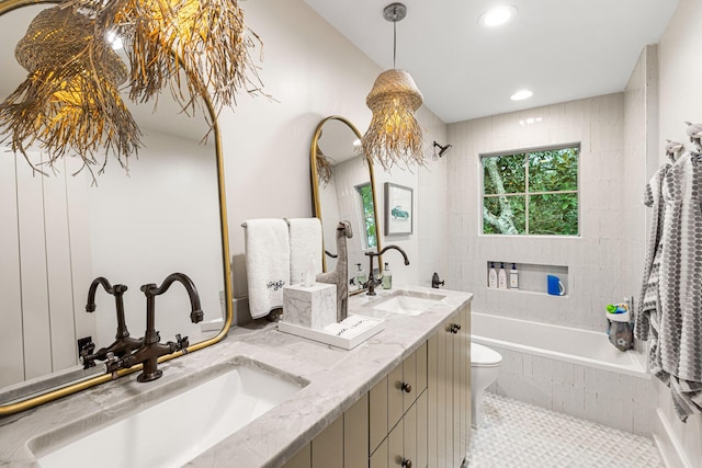 bathroom featuring tile flooring, dual vanity, and toilet