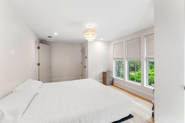 bedroom featuring light wood-type flooring